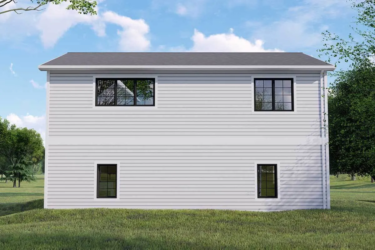 The back of the home has black windows with white trim.
