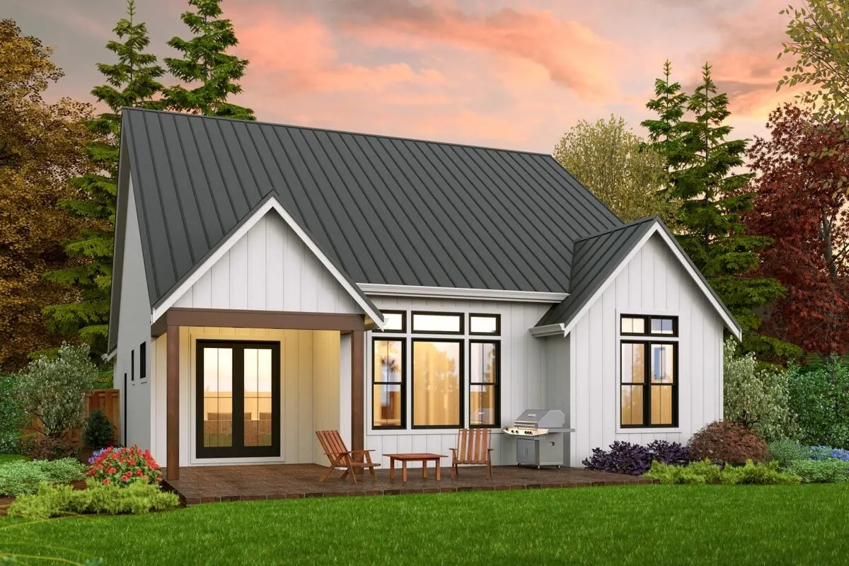 Back picture of the home showing an outdoor living area with a charming appeal.