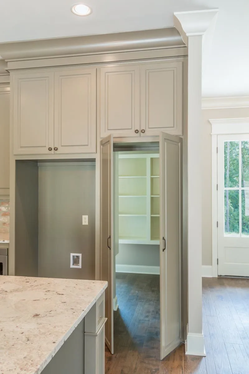 Close-up of the pantry for additional storage.