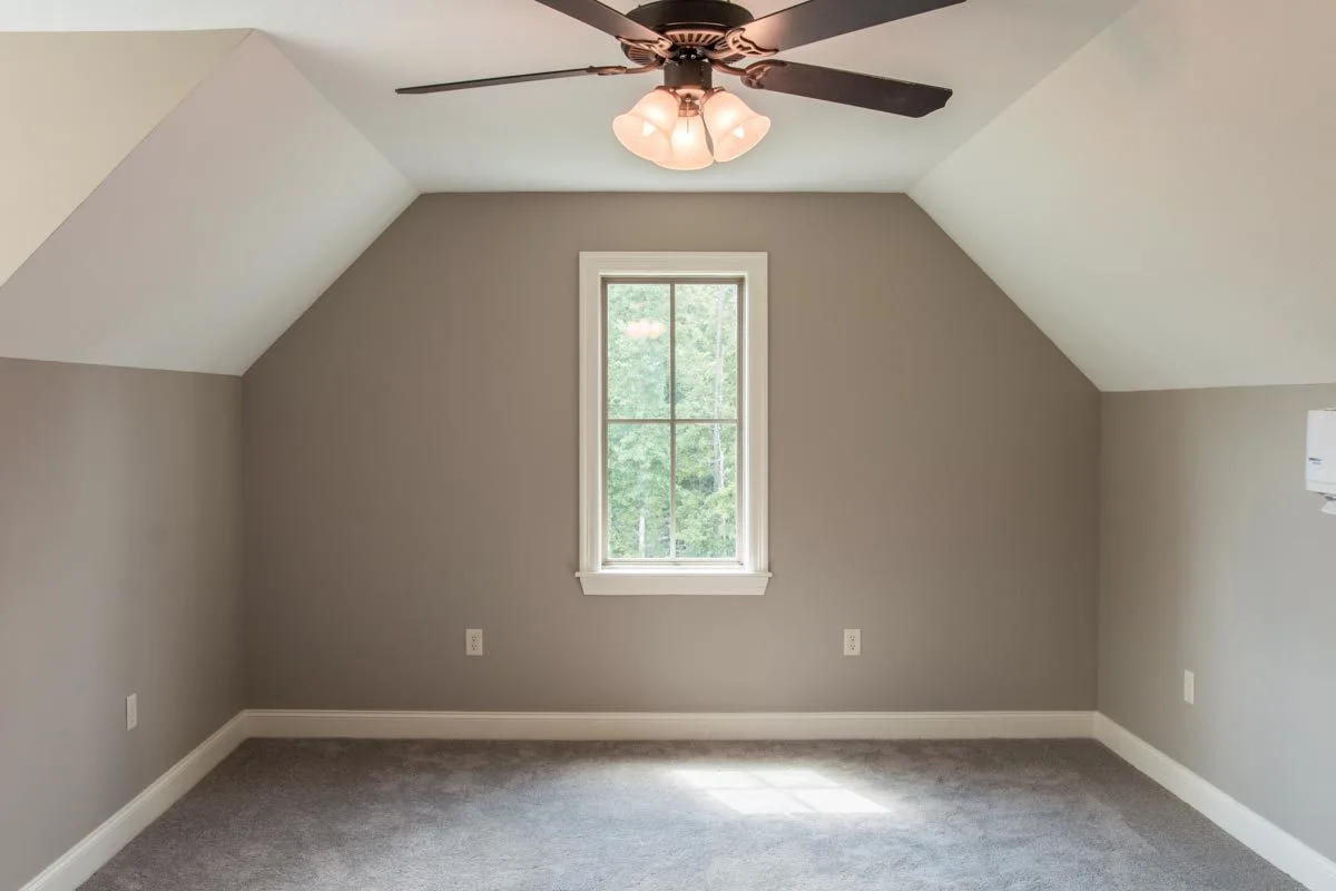 One of the bedrooms has a hexagonal-shaped space.