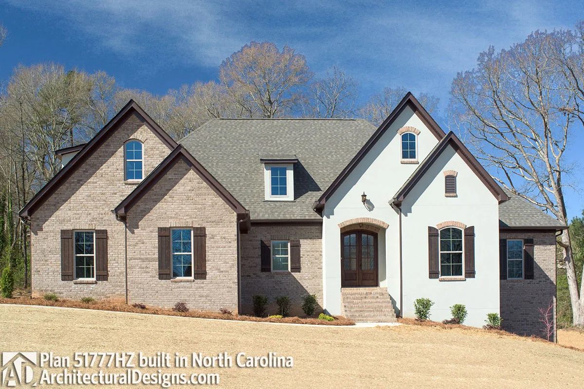 A classic French-style Southern home with a large high ceiling in the front.