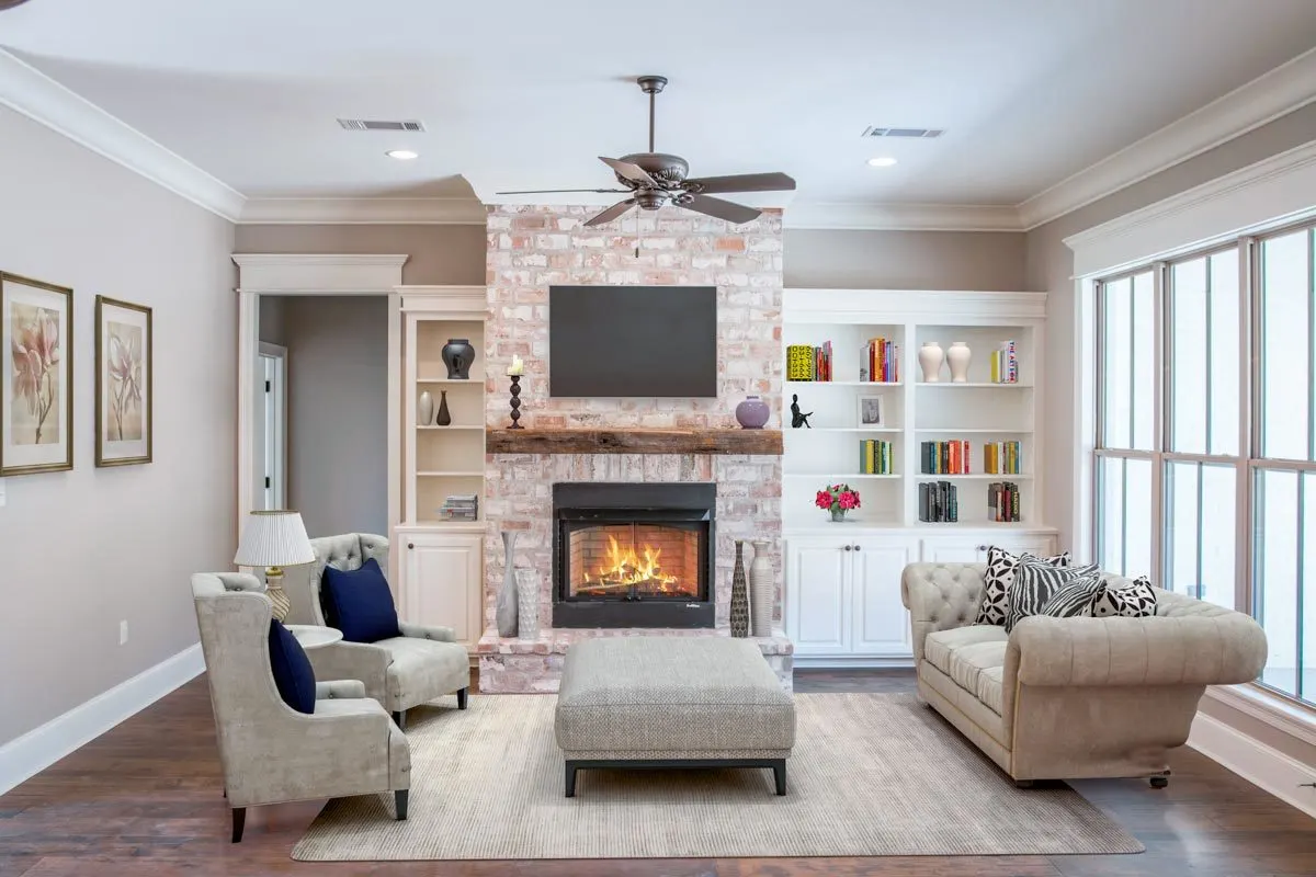 A high ceiling in the living room area makes it appear more spacious.
