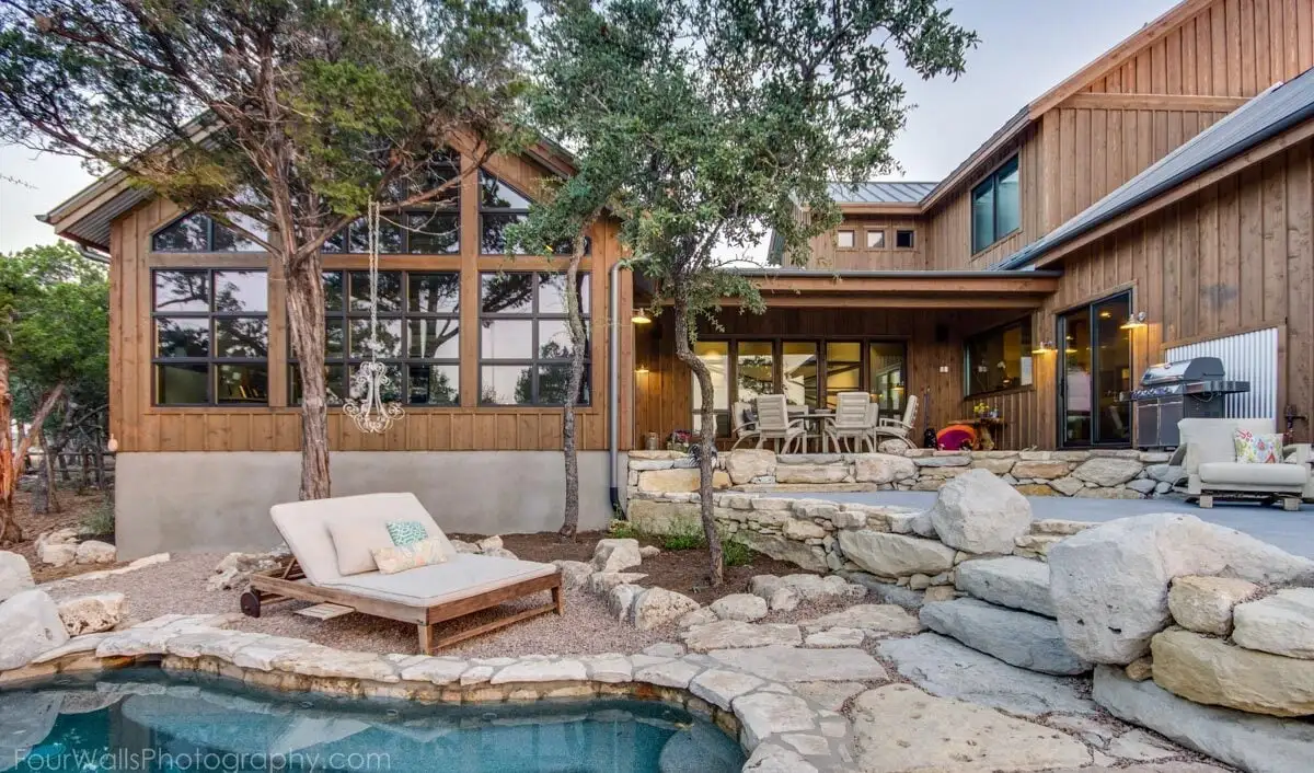 From this distance, the courtyard can be seen with its rock landscape, pond, and covered terrace.