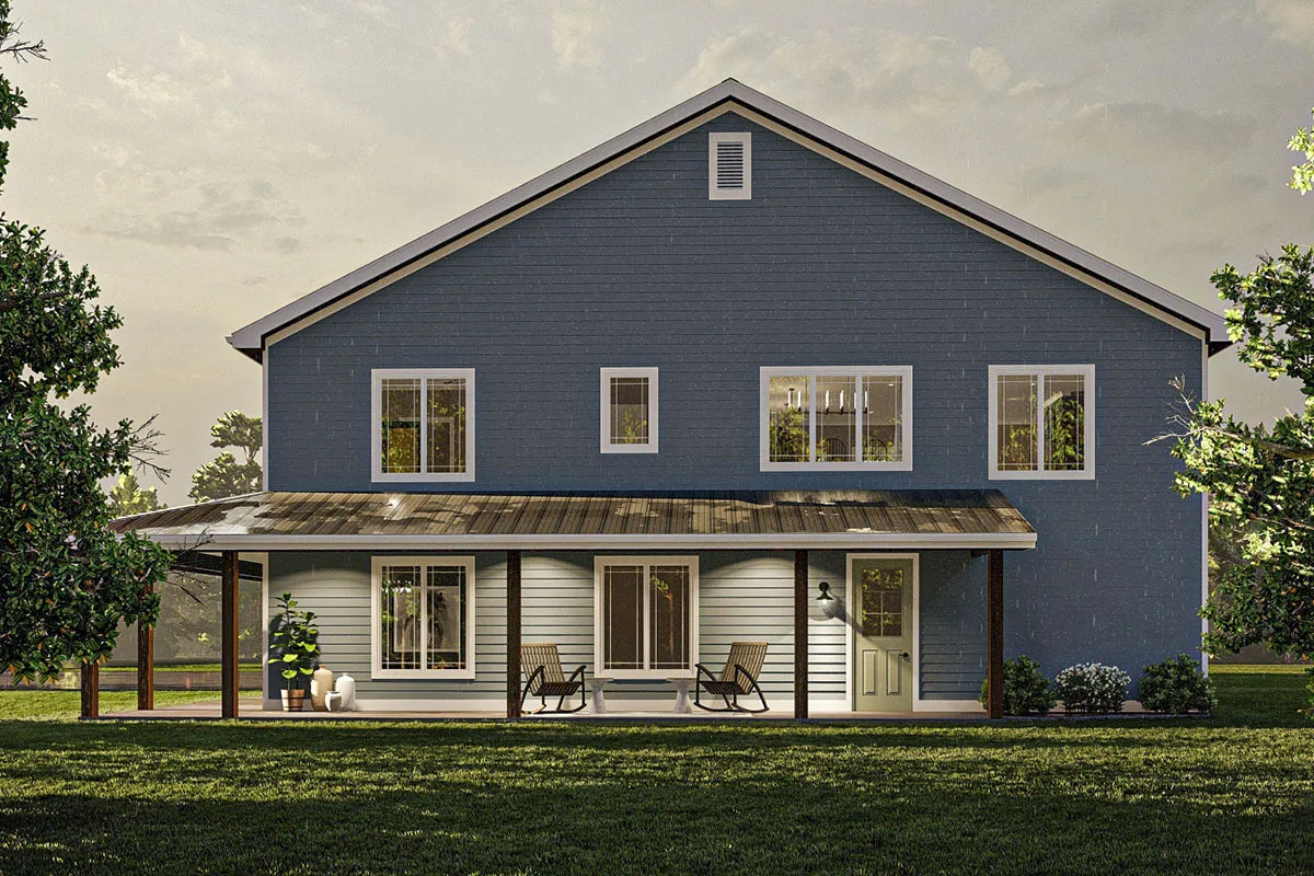A closer look at the front of the house highlighting the covered porch and a 4 glass window on the second floor.