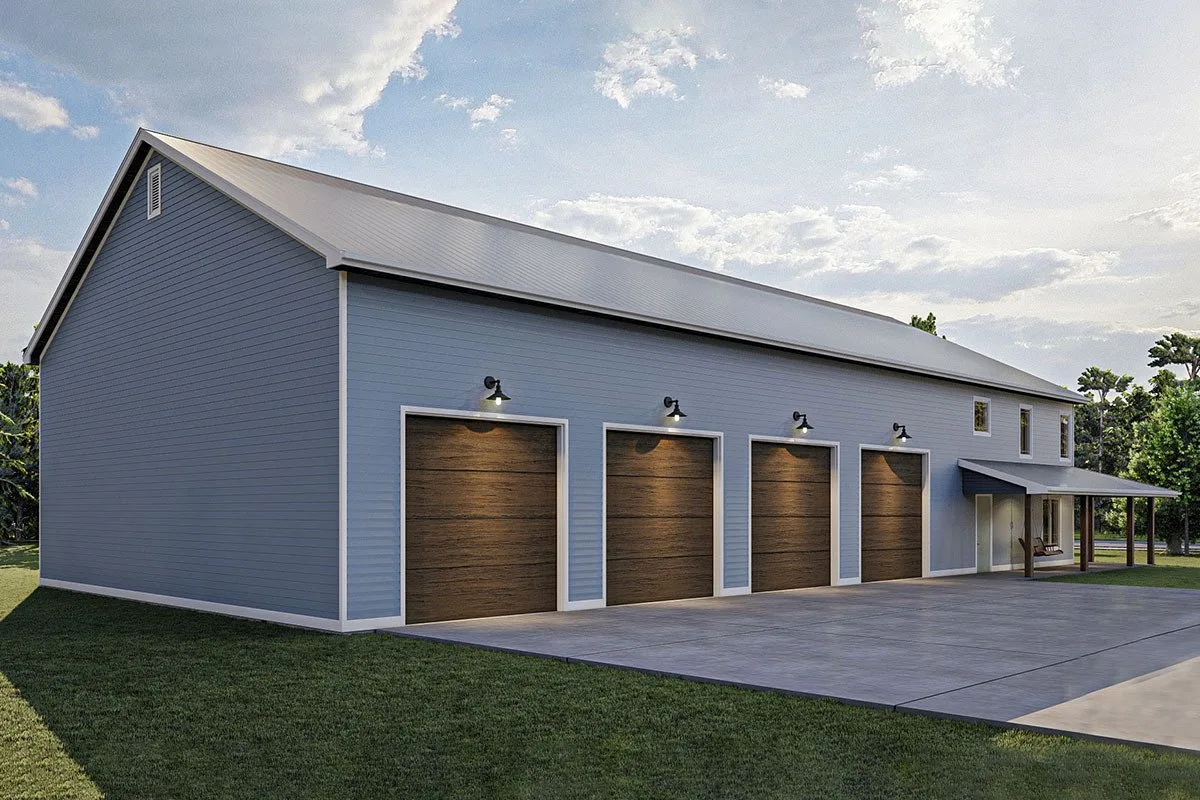 A look at the spacious garage with 4-entry doors and a stone driveway.