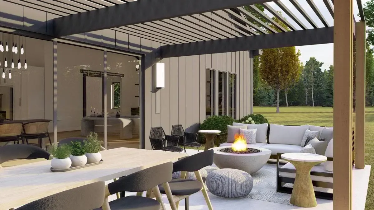 A better look at the outdoor lounge, complete with plush sofas and a fireplace.