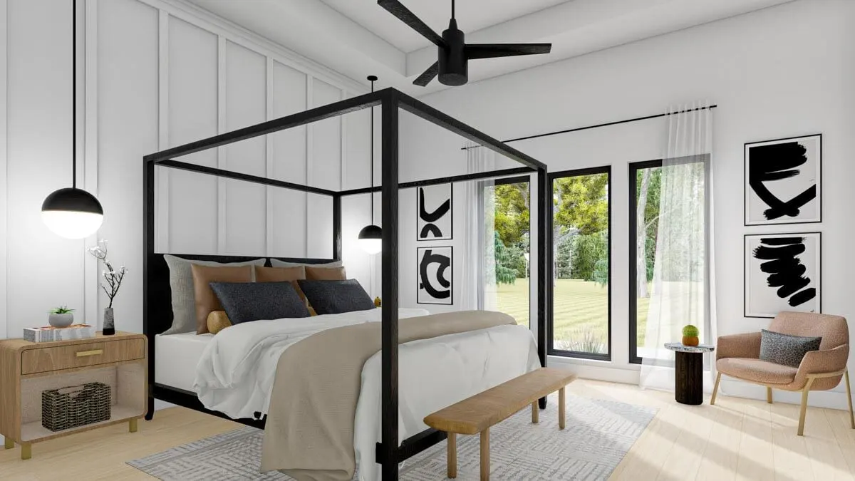 The first-floor master bedroom features a stunning bed frame that elegantly complements the wooden furnishings and abstract artwork that adorn the otherwise white walls.