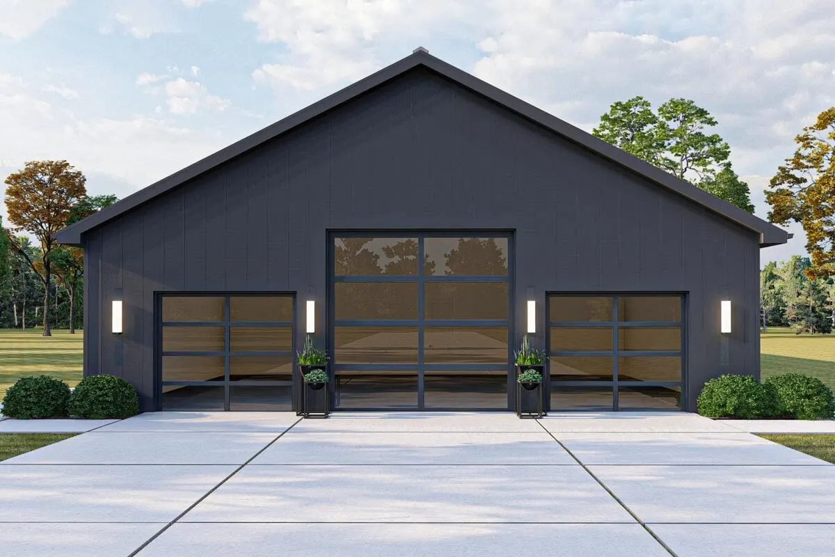 The three-car capacity stone driveway set in the grassy backyard is a perfect illustration of the country-rustic design of this home's rear.
