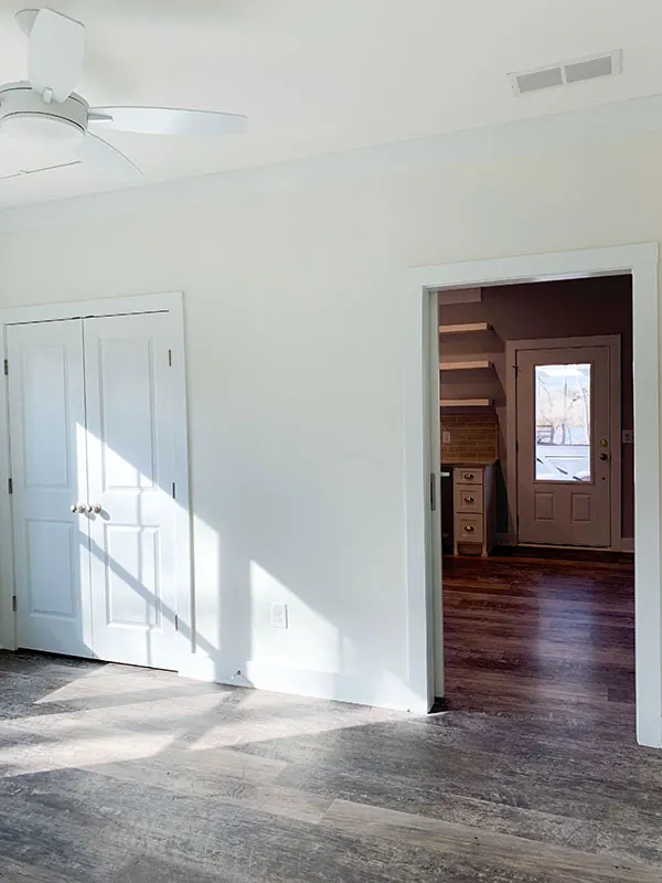 A view of the kitchen from the dining area.