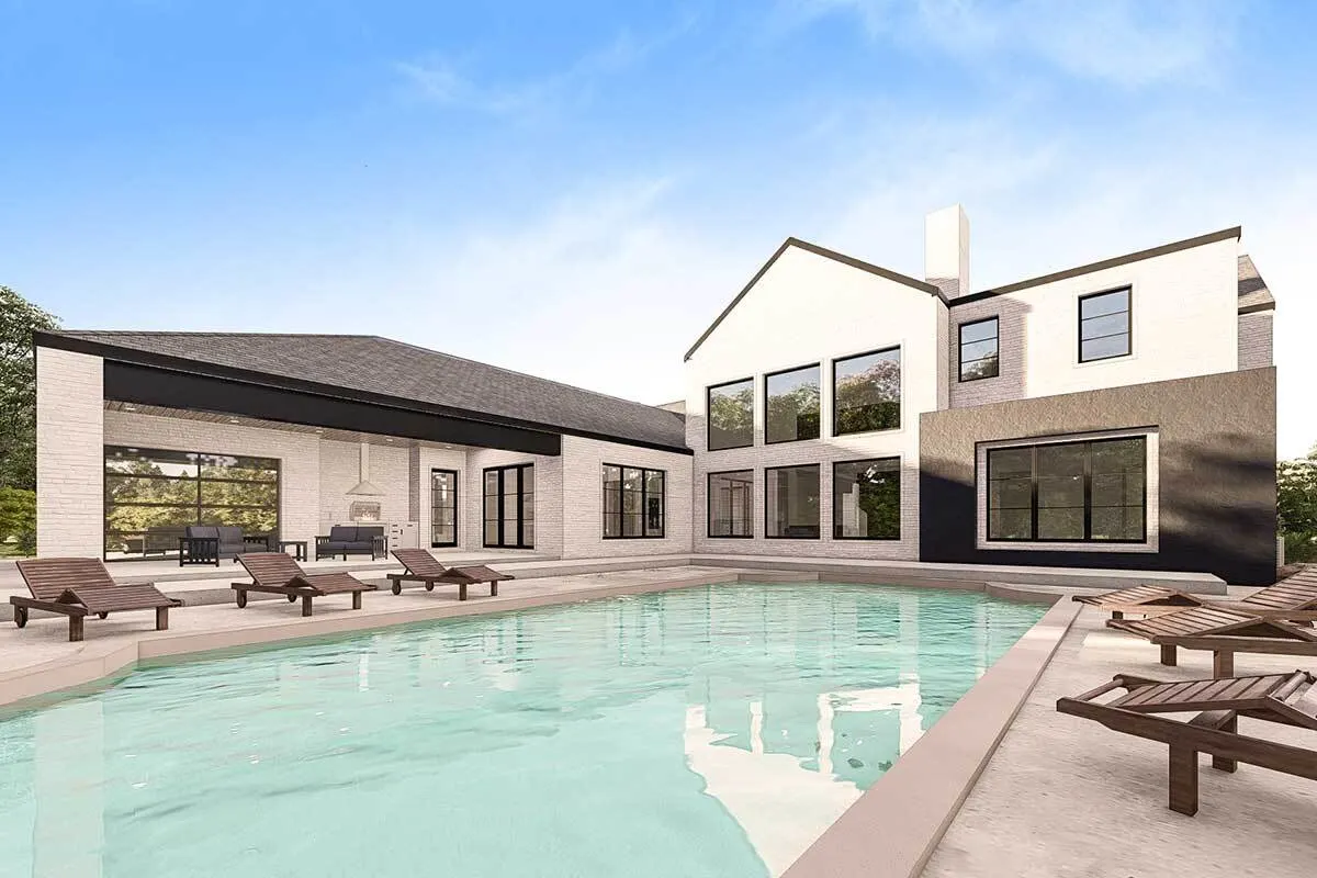 Swimming pool with a peaceful outlook next to the covered porch.