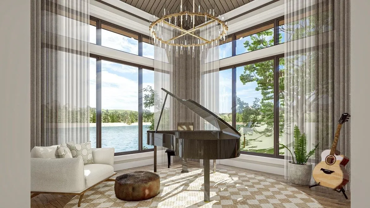 A modern lounge with glamorous musical instruments and a round chandelier overhead.