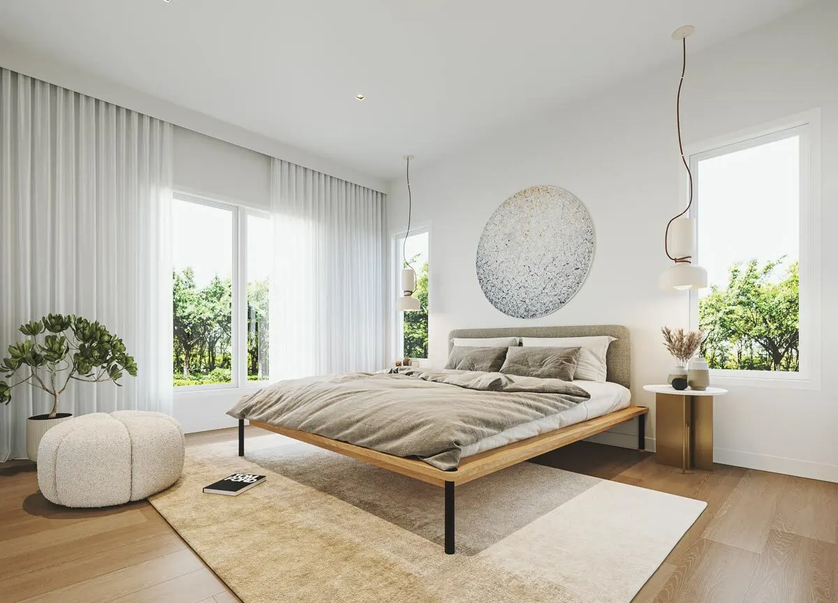 A spacious bedroom with a simple style for a serene and pleasant environment.