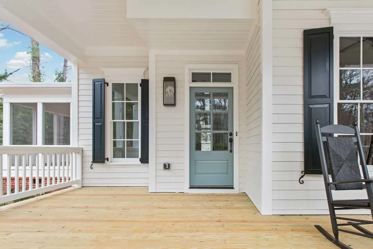 The main entrance's light blue hue mixes very nicely with the façade.