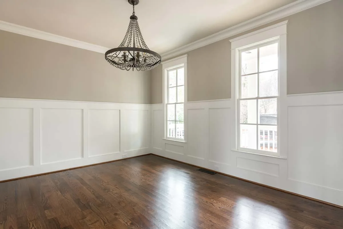 The family room flaunts a lovely, huge chandelier.