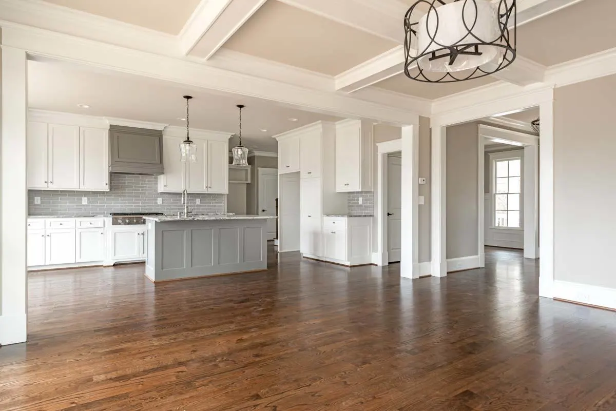 The kitchen space is painted gray and white hue.