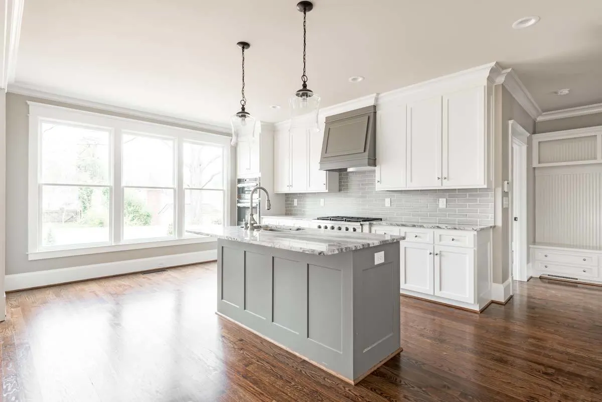 The kitchen is naturally bright thanks to a big window.