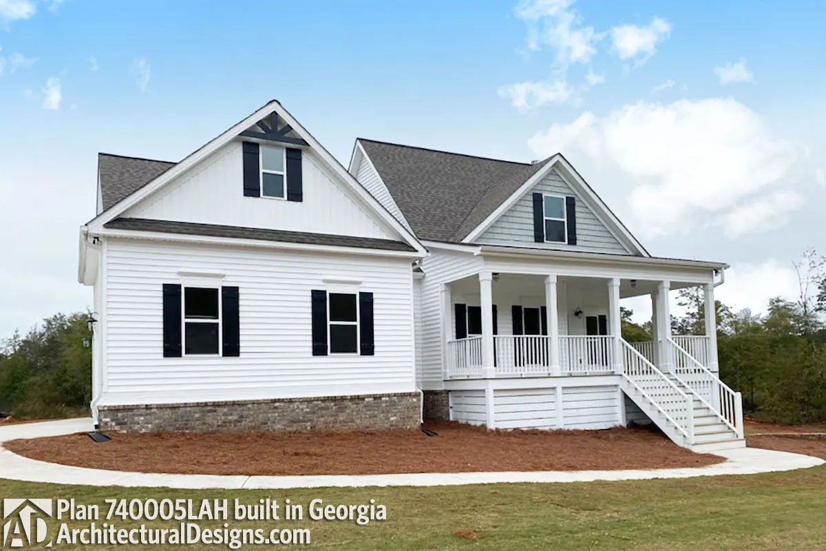 The porch is accessed through a stairway on a separate version of the house.