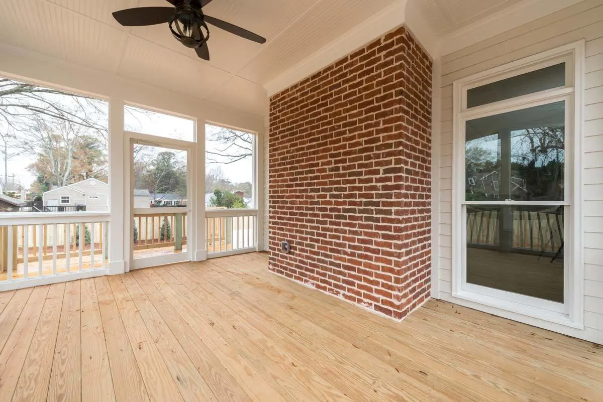 The fireplace's red brick base is clearly visible.