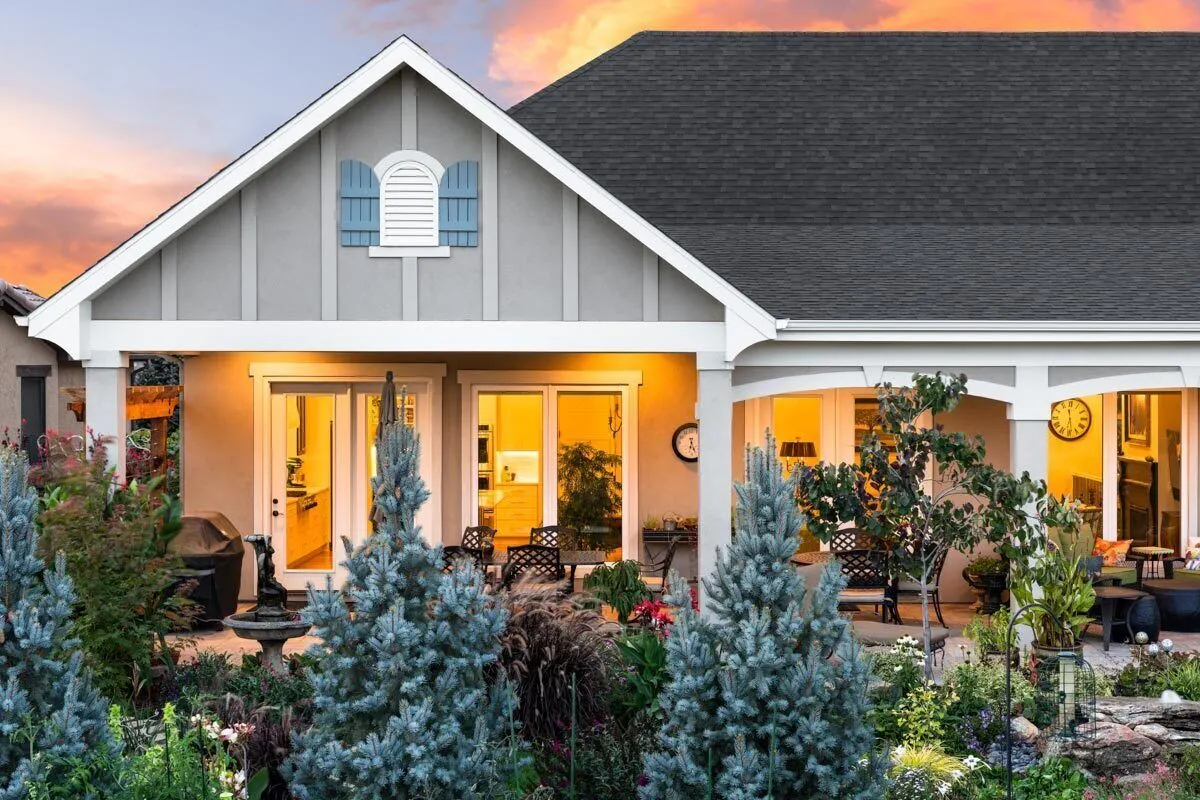 The front porch area appears lovely as you peek inside through the glass doors.