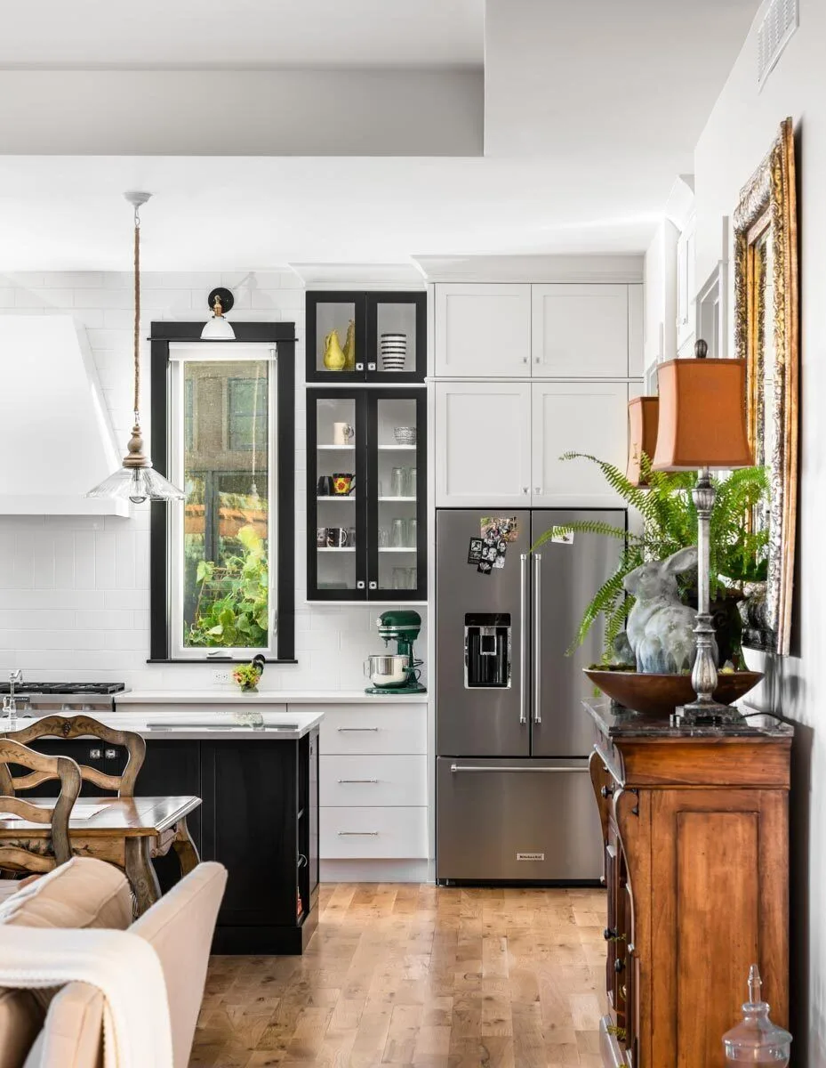 The kitchen room features functional cabinetry and equipment.