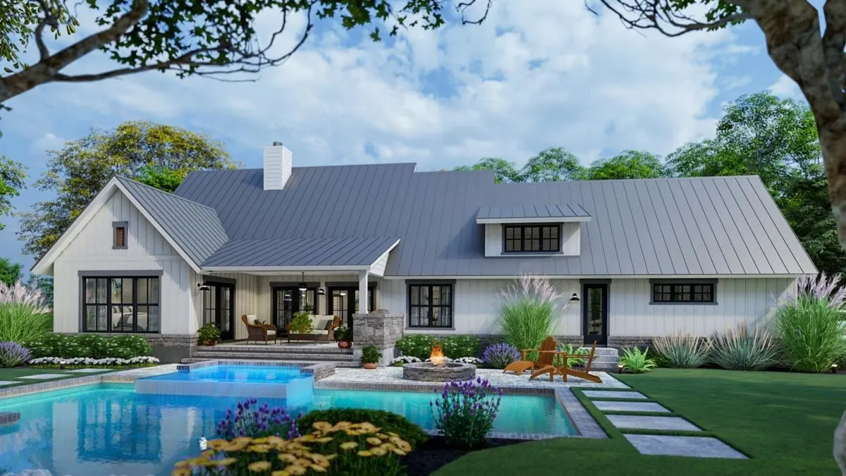 View at the back side of the farmhouse where the rear porch and the spacious lawn where you can put your pool. (Pool not included)