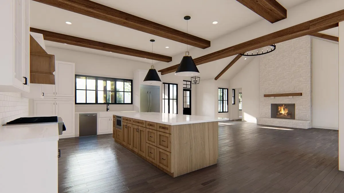 A roomy, bare picture of the living room and kitchen.