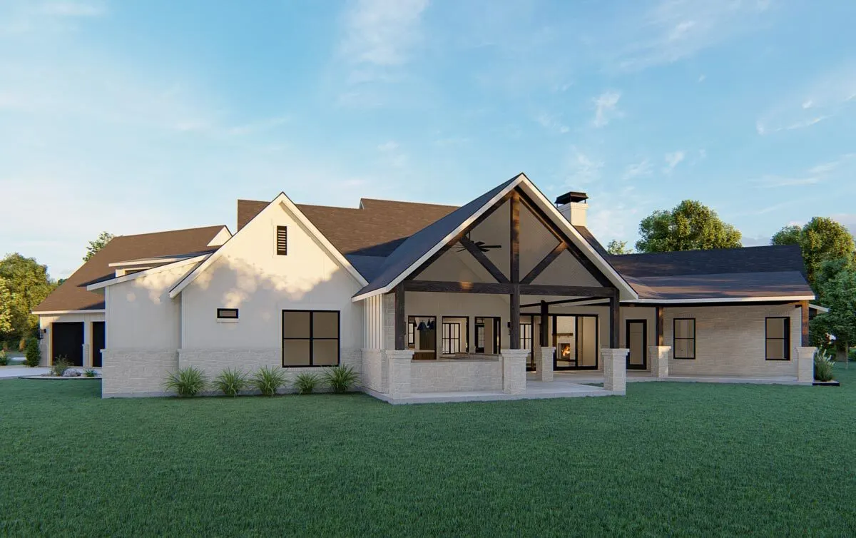 The farmhouse's beautiful porch and cathedral ceiling are highlighted in this back perspective.