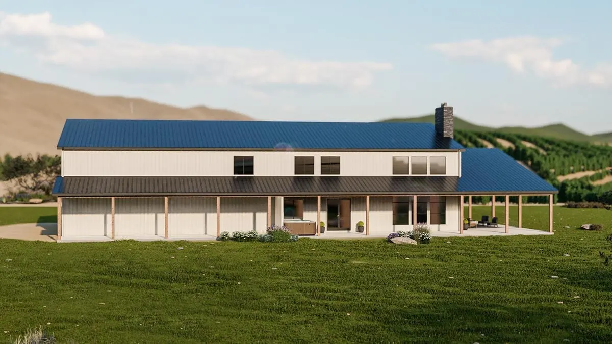 A look on the other side of the barndominium highlights the lengthy covered patio. 