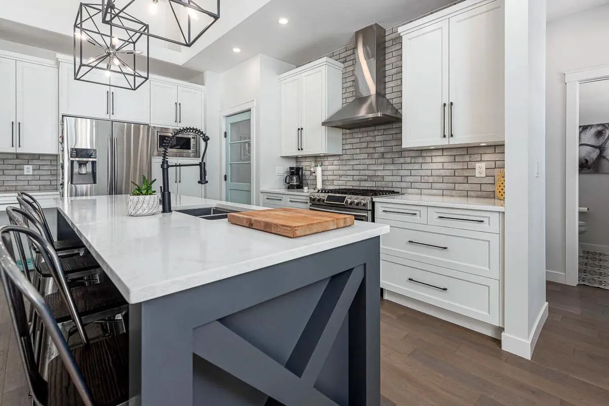 The interior of this contemporary kitchen looks amazing with its gray stone brick walls.