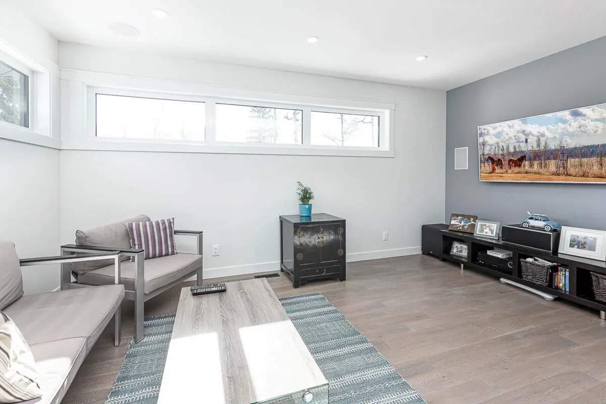 Large family room with antique décor on the upper floor.