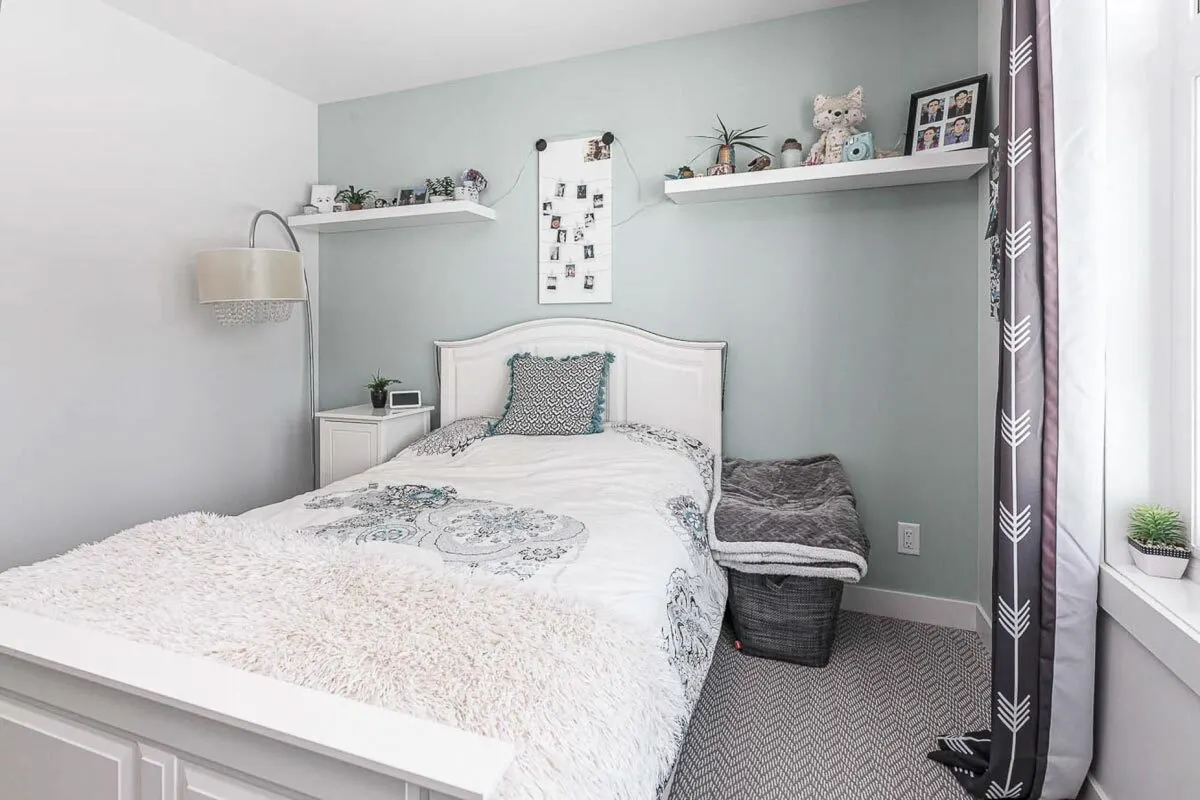 With an ideal rack mounted on the wall, a bedroom's aesthetic stands out.