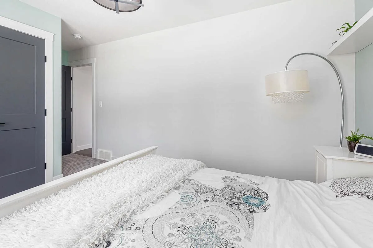 On the side of the bed, a chic lampshade was perfectly placed.