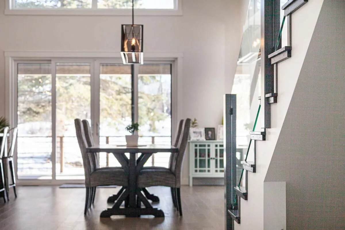 Area for dining next to the white sliding door leading to the covered deck.
