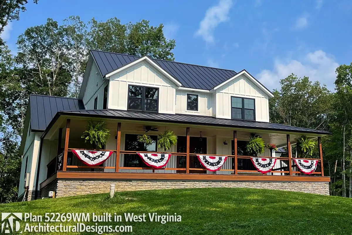 View of the leveled wooden wraparound porch of the farmhouse.