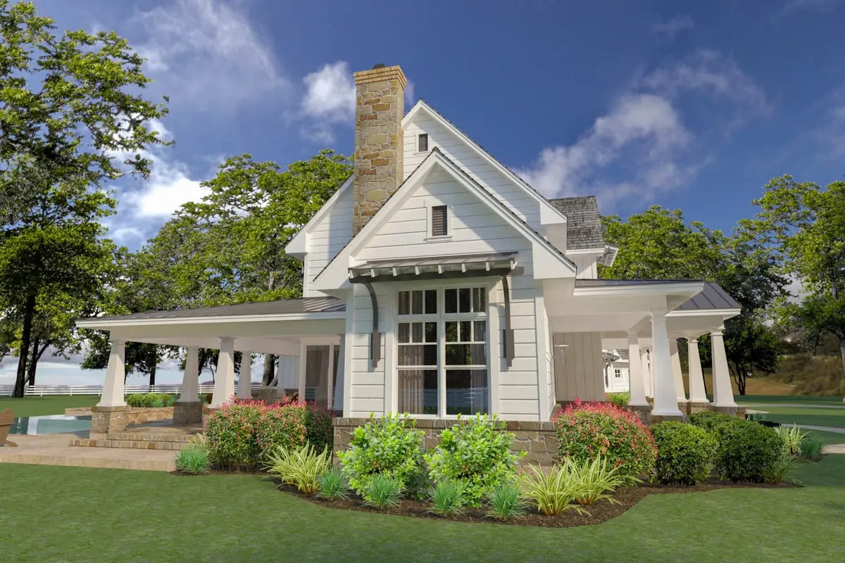 The porch with stone flooring looks wonderful from the side perspective of the home.