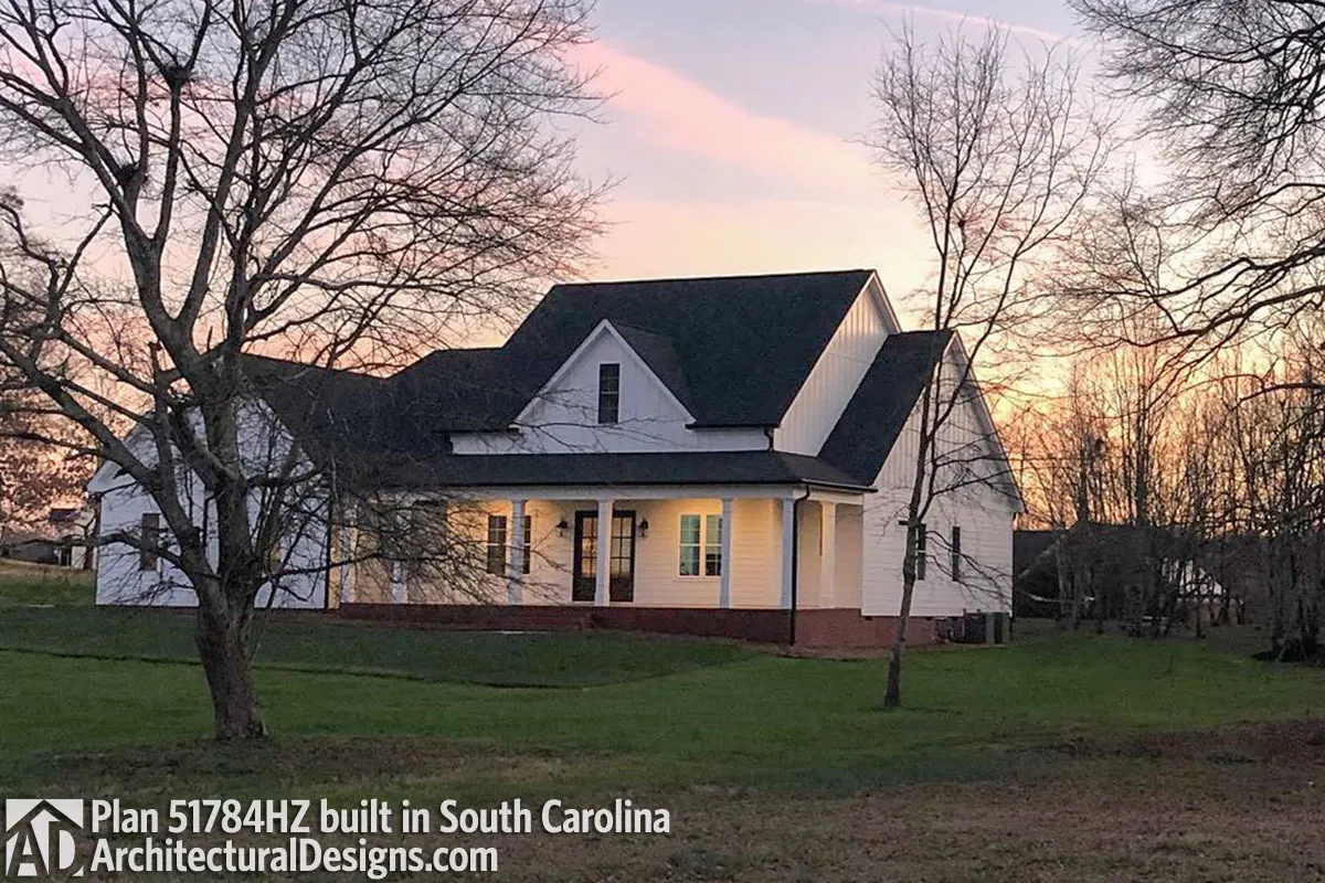 At dusk, the farmhouse appears beautiful from afar.