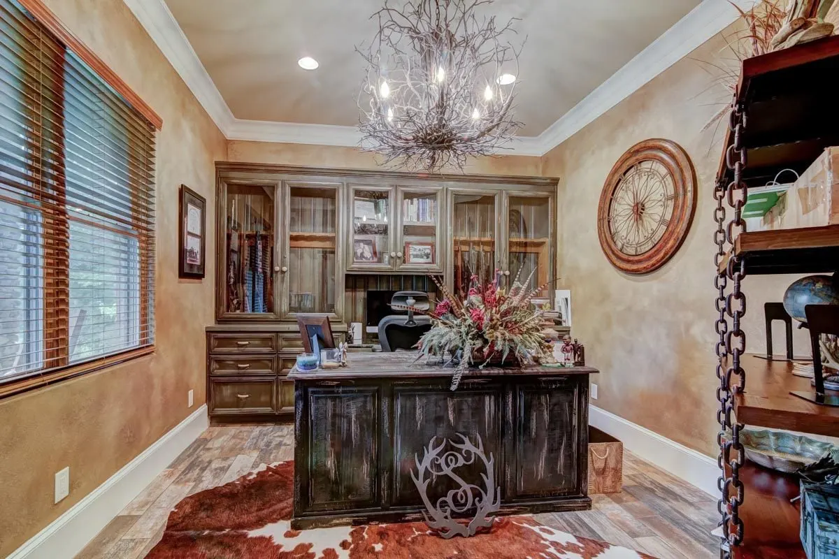 A vintage-style study space looks amazing with a unique wooden chandelier.