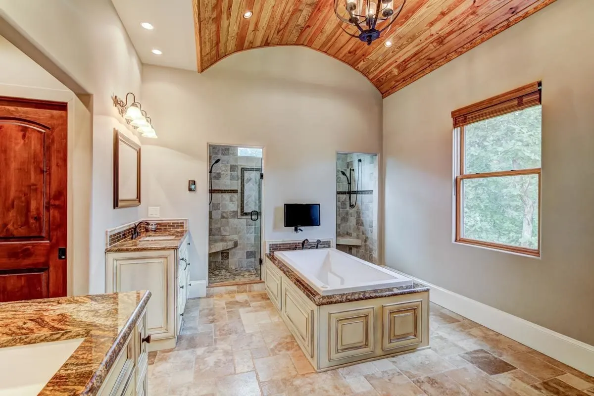The wooden arched ceiling matched the window frame and shutter.