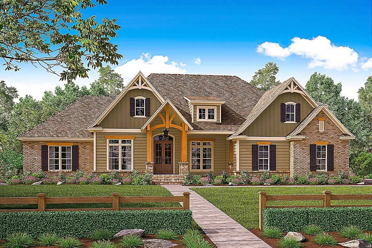 A lovely front view of the house's façade in rustic design, complete with a landscape and fence.