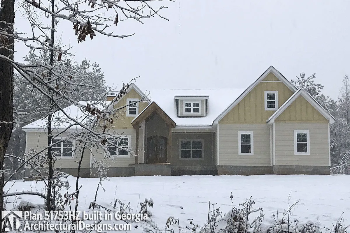 The craftsman's house appears to be robust, despite the thick snow in the surroundings.