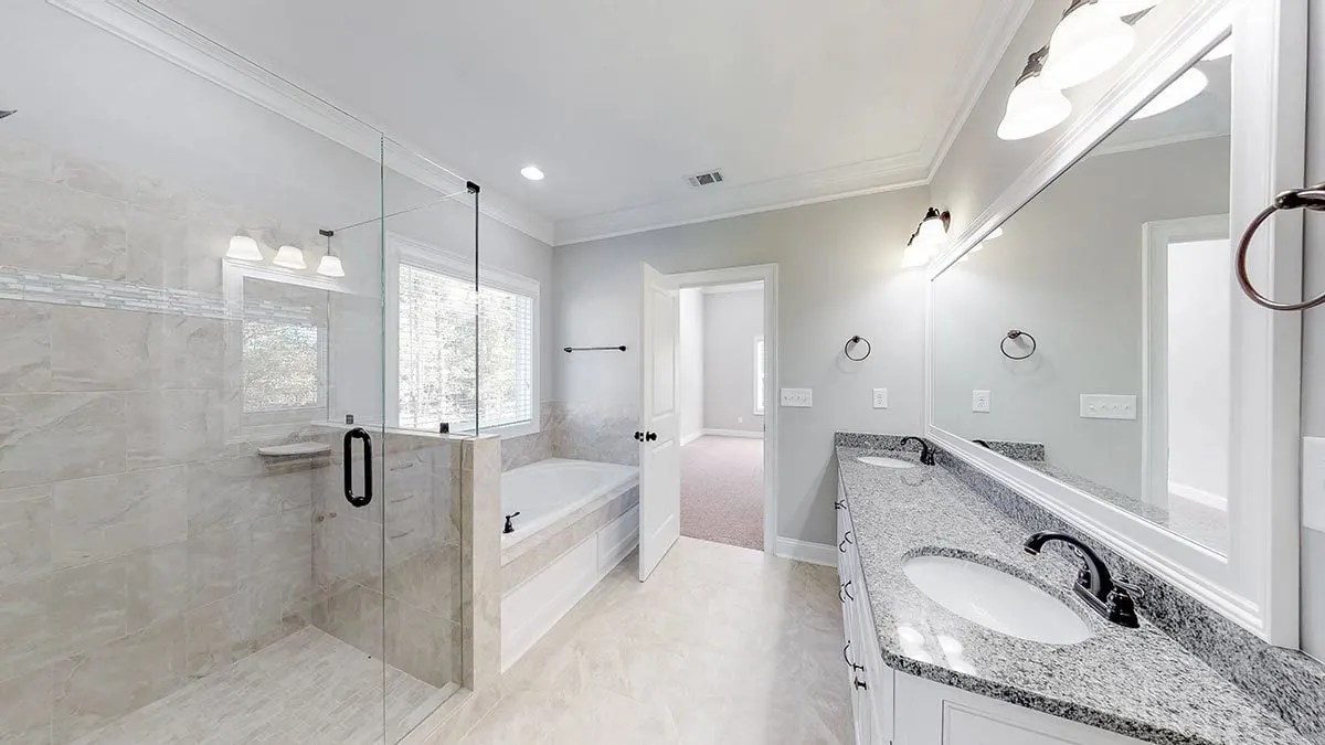 A very spacious bathroom with a minimalistic stylish appearance.