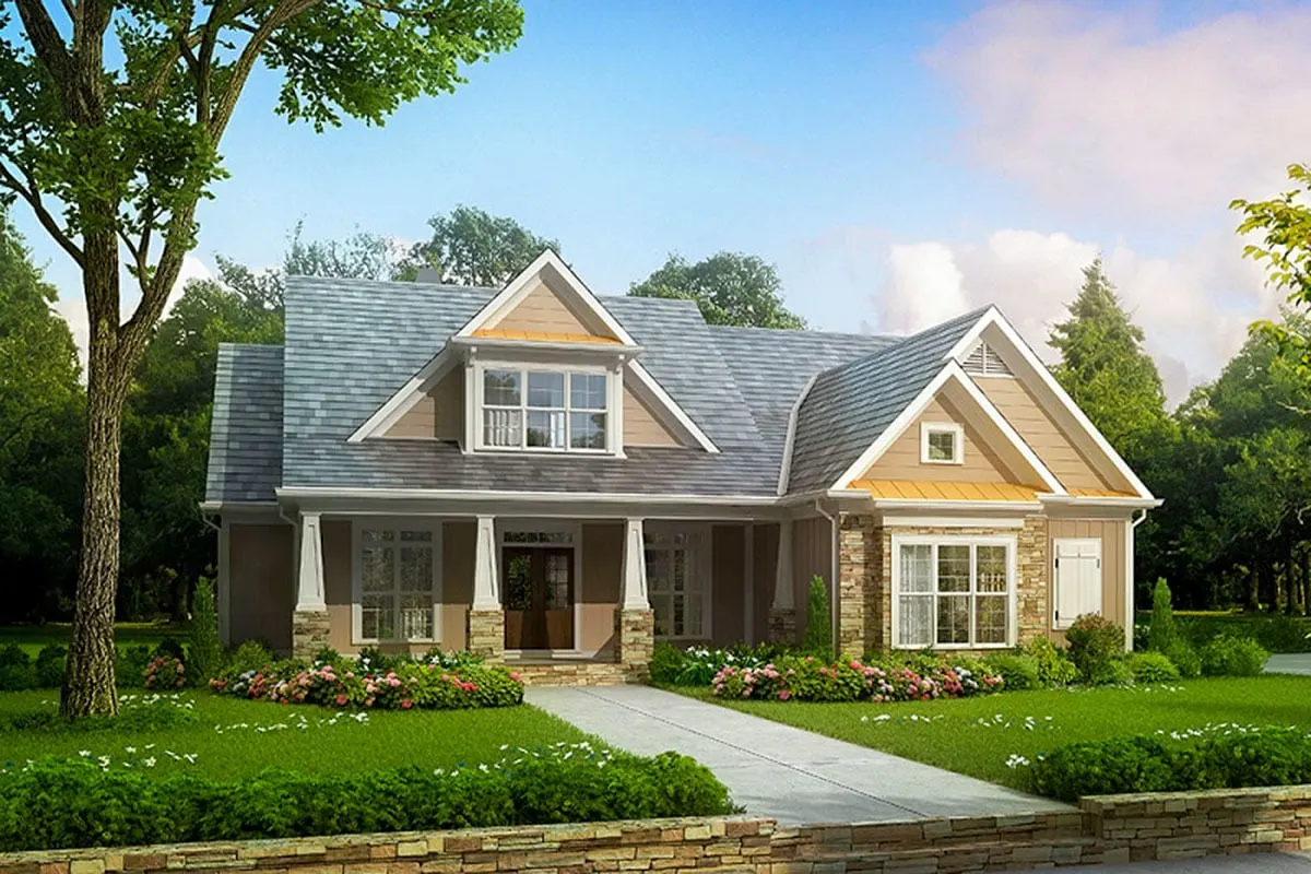 Stunning yellow window dormer in the front view of the home.