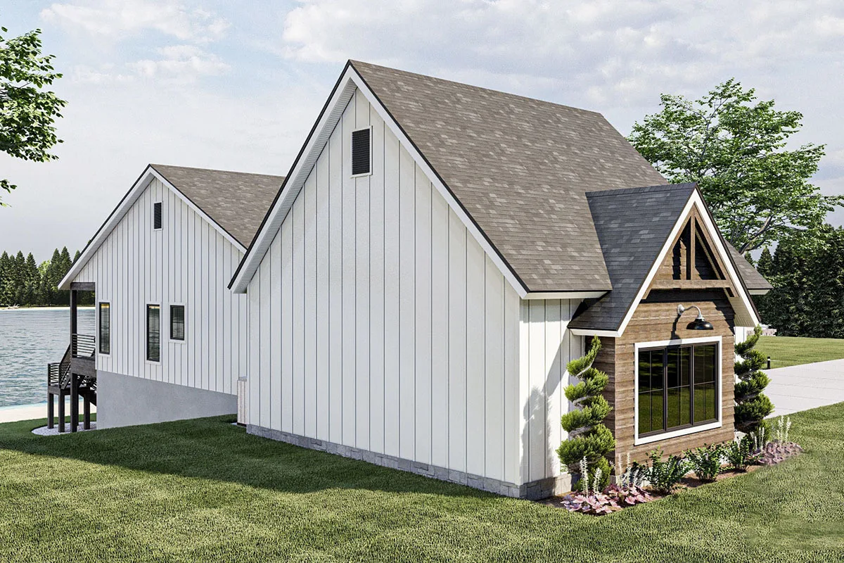 The left side of the home features white siding on the wall and a stone foundation frame.
