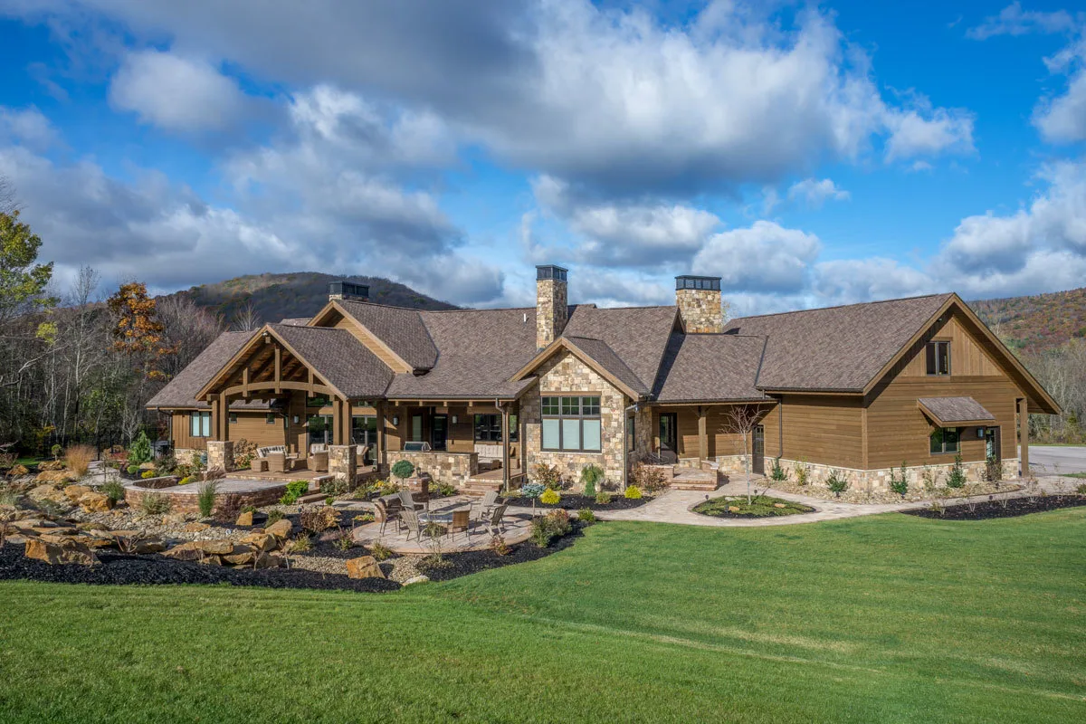 An aerial picture of the ranch home with a rocky landscape is breathtaking.