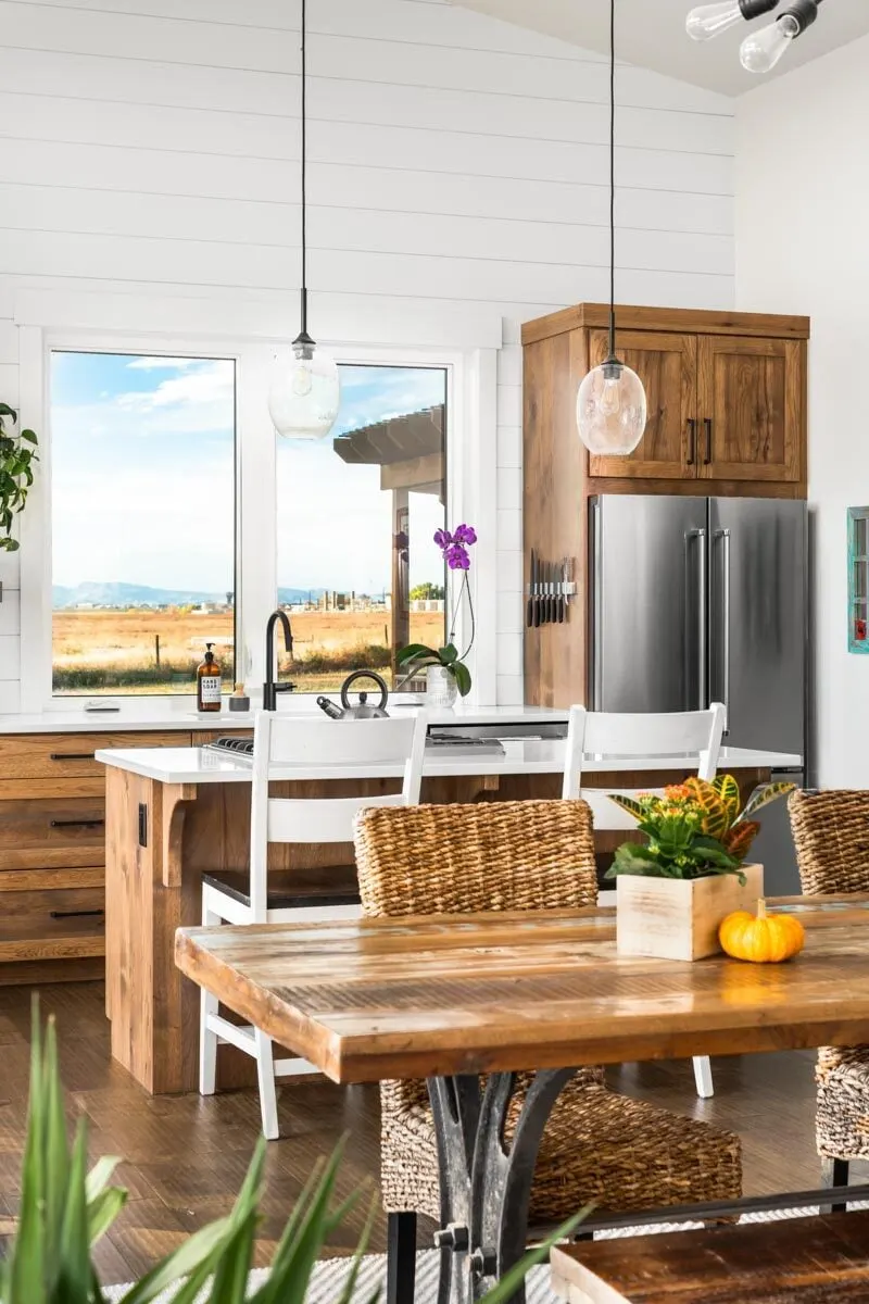 The stylish light fixture really looks amazing in the dining area.