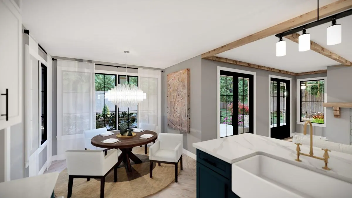 The dining area is elegantly presented with a chandelier above.
