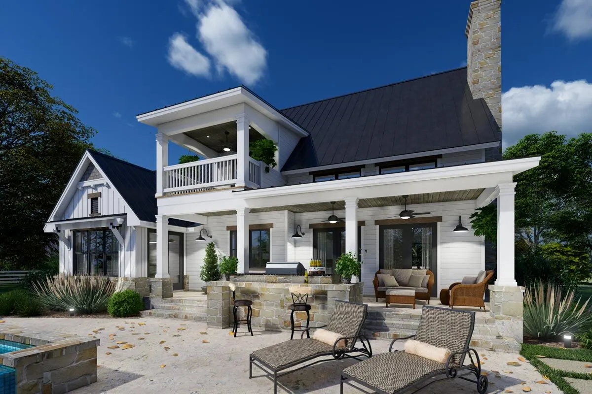 An area for people to relax with a covered porch that overlooks the pool.