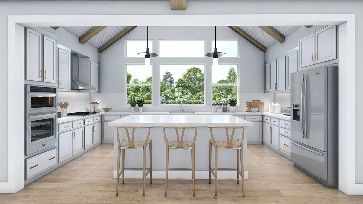 The U-shaped kitchen portion of the house is lovely, with a large window overlooking the outside.