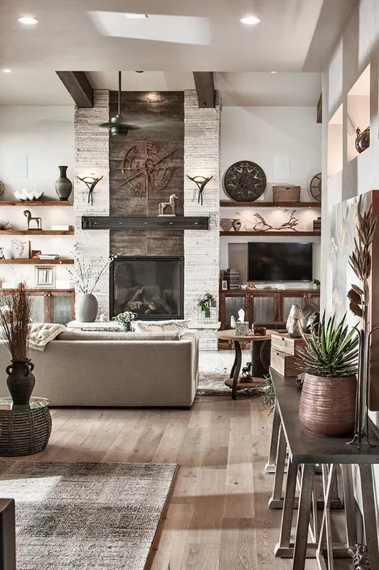 The living room features a rich wood crafts décor.