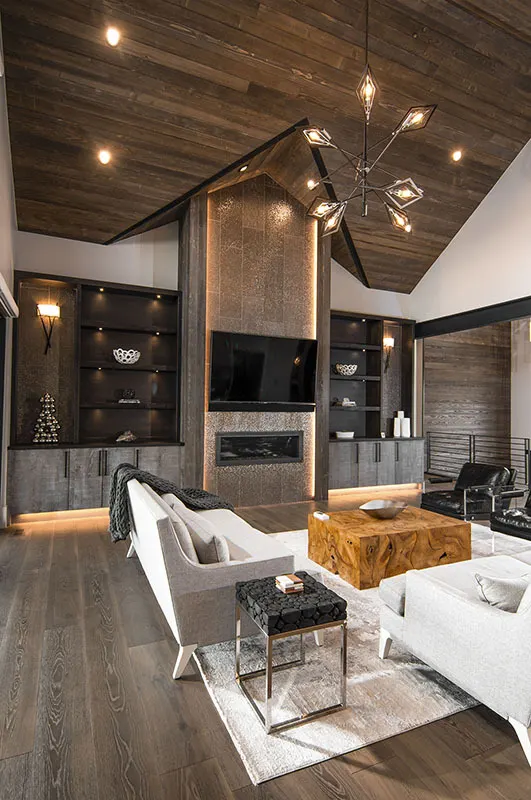 The huge built-in racks have an exquisite appearance in the rustic design living room.